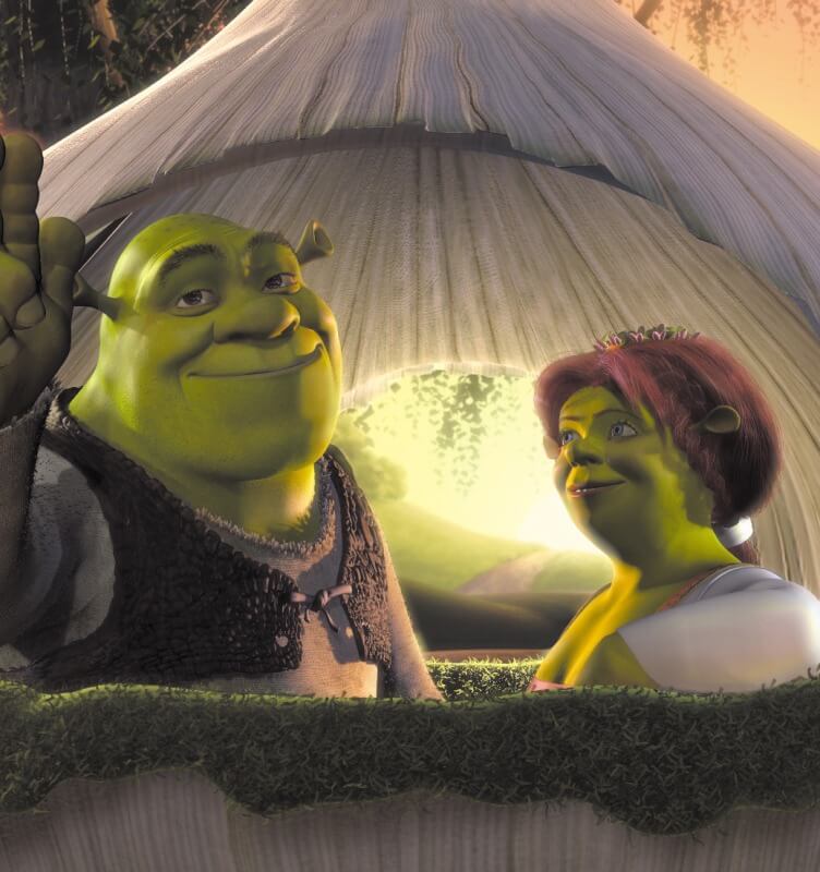 Shrek et Fiona assis dans un carrosse à oignon