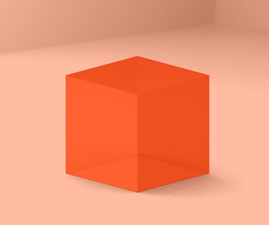 cube orange sur un fond pêche