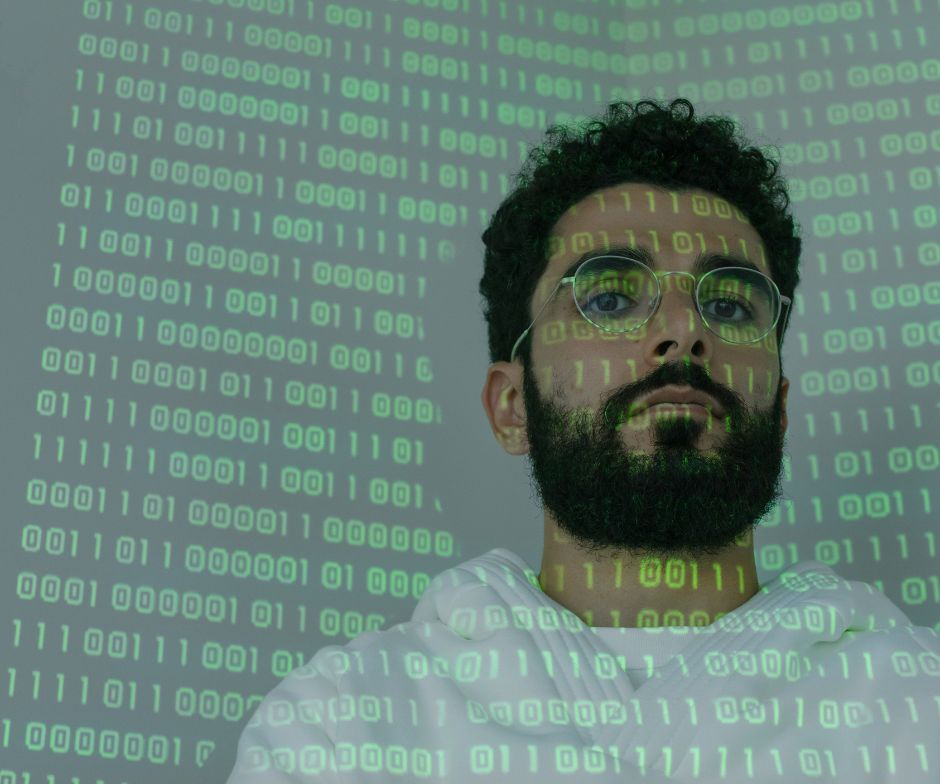 person image in the background with binary numbers on top of the person image