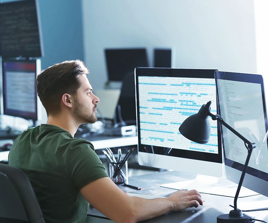 A person working on computer in a office