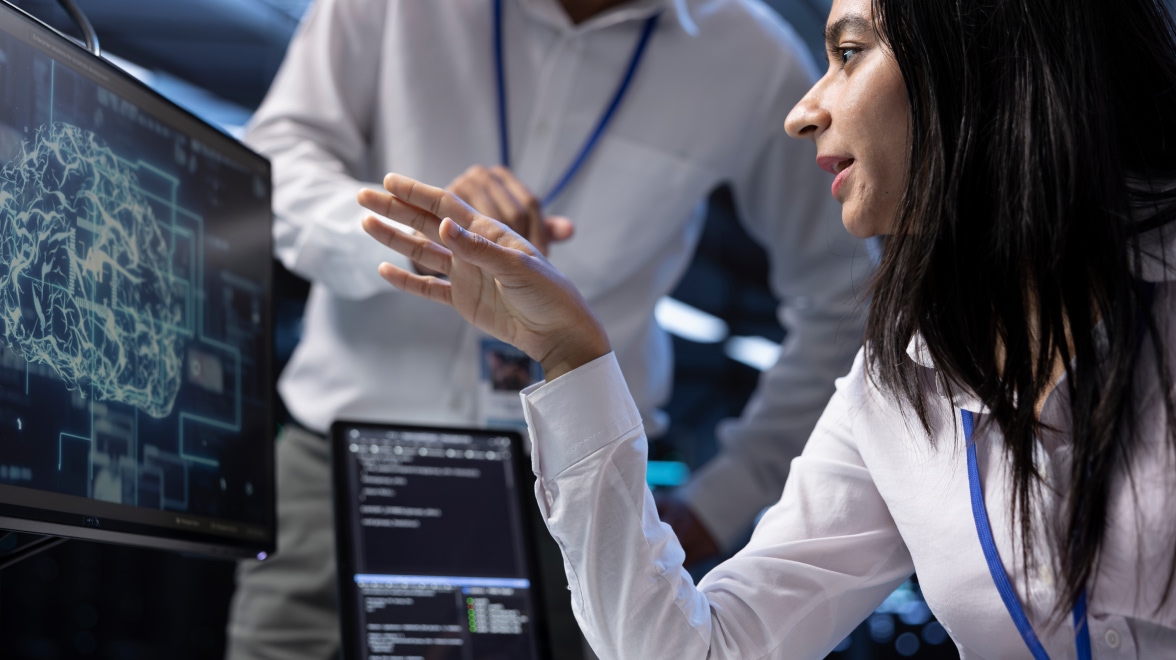 Two people talking to each other by seeing the monitor