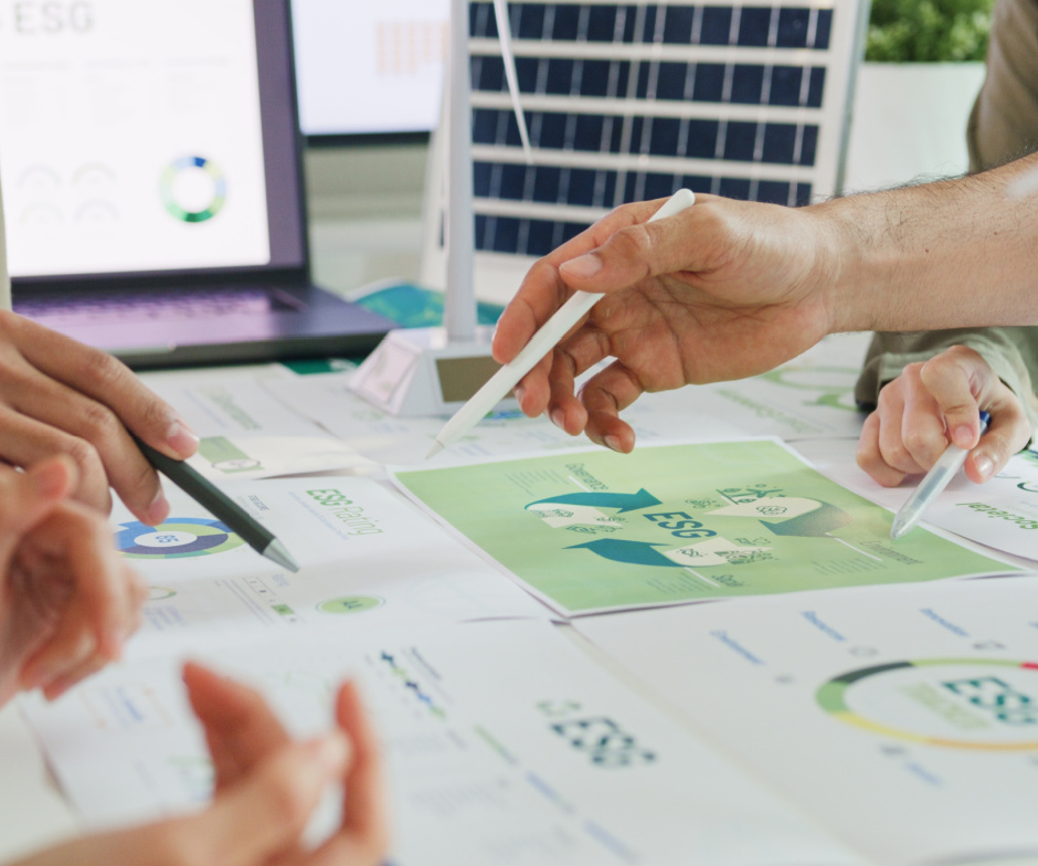 people analyzing data by looking different graphs