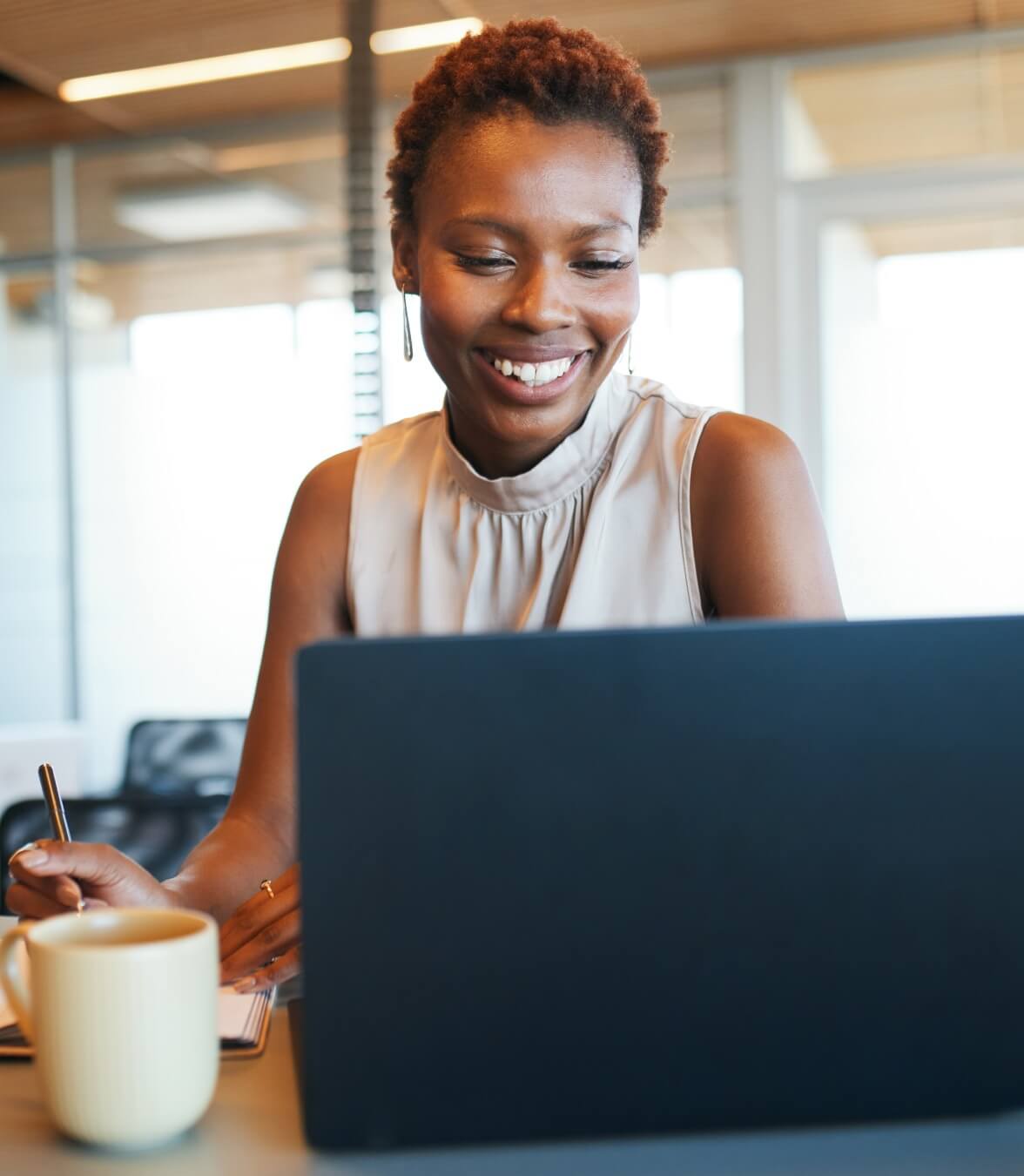 Lady looking at her laptop