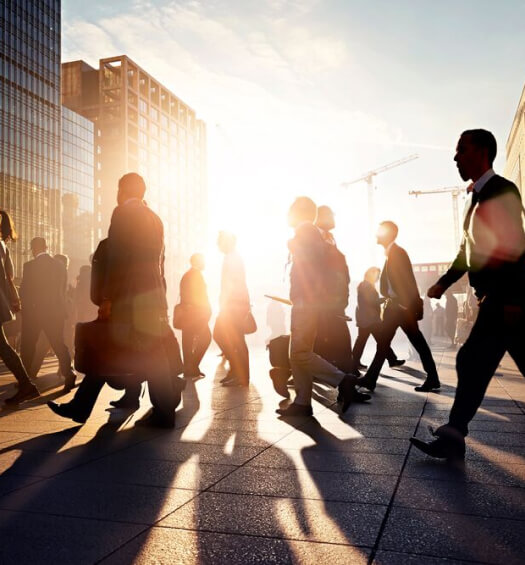 People walking with sunlight shining