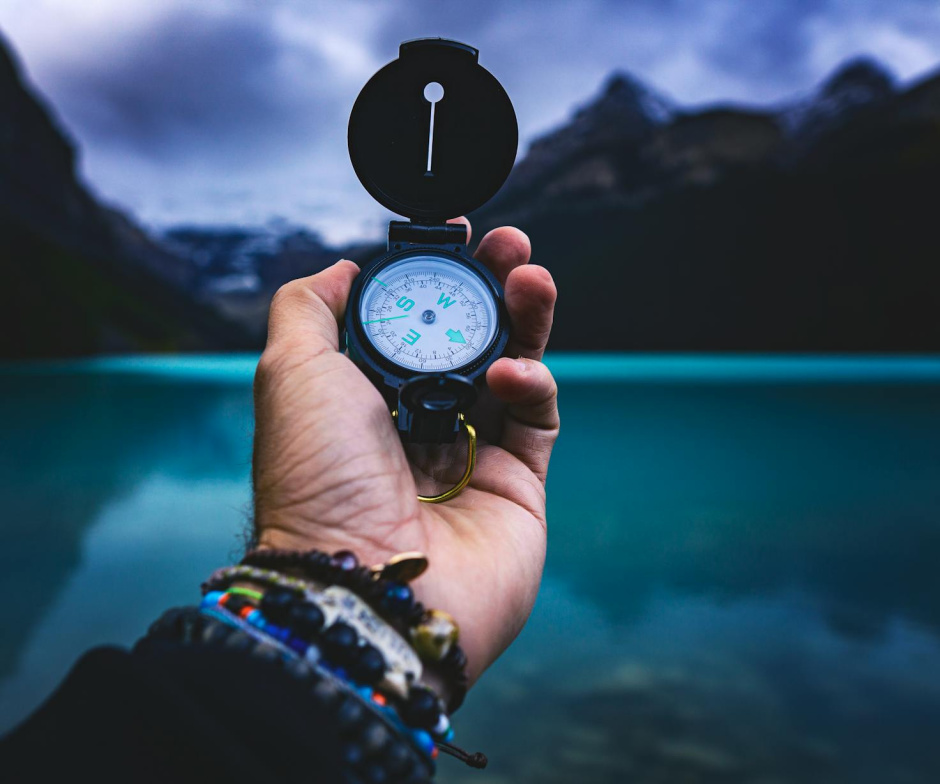 hand holding pocket watch