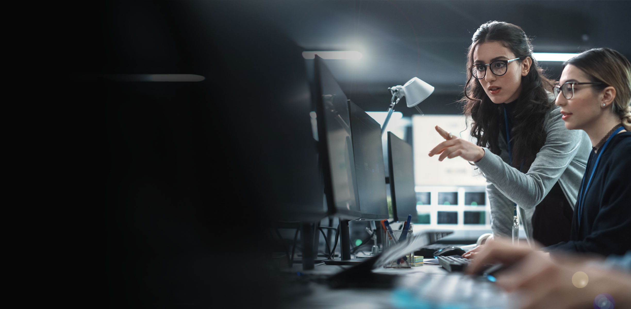 two people looking at a computer screen