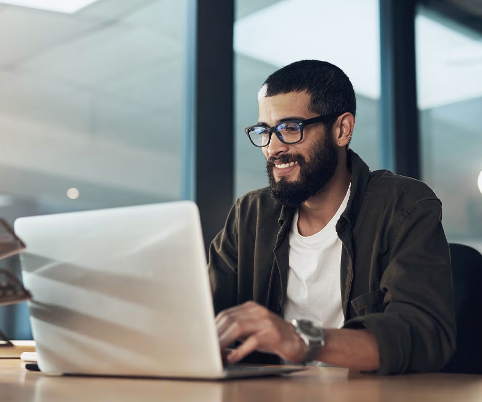 man working in his laptop